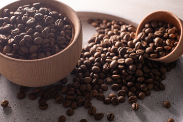 Coffee beans in a wooden cup
