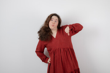Image of a young cute girl with down syndrome standing and posing