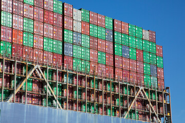 Fototapeta premium USA, Georgia, Savannah. Container ship in the Savannah River.