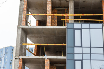scaffolding on a building wall. building getting a new paint.