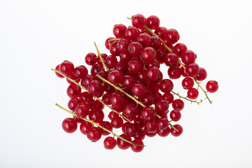 Fresh raw red currant berries isolated on white