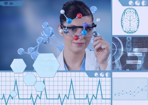 Female scientist touching 3d molecules with human brain and scientific data processing on screens