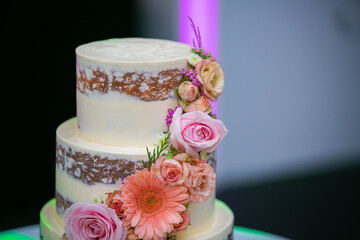 Beautiful wedding cake decorated with flowers