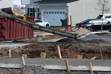 pouring cement during sidewalk upgrade