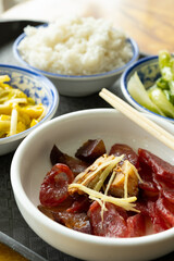angle view fast food of Chinese style sausage and bacon and salty fish with scrambled eggs and hotbed chives and cabbage with rice vertical composition