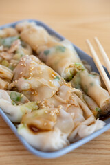 angle view traditonal Cantonese food of cheong fun or rice noodle rolls vertical composition