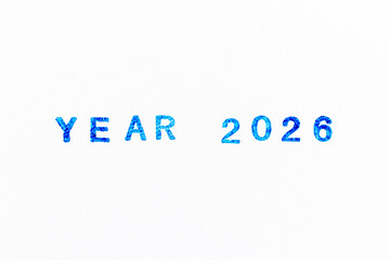 Blue color ink of rubber stamp in word year 2026 on white paper background