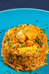 spanish paella dish with seafood, rice and chicken Top view