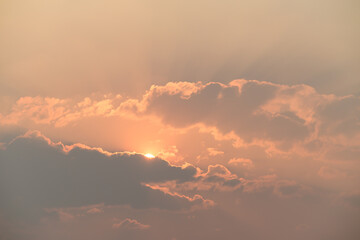 Beautiful vanilla sky with clouds and sunlight before sunset, Nature background