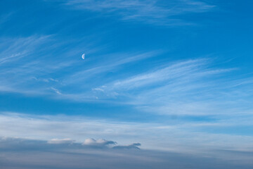 Naklejka na ściany i meble blue sky with clouds and moon