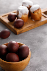 Obraz premium Still life many colorful easter eggs on a textural background. Rustic. Easter celebration concept.