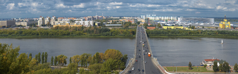 Kanavinsky bridge in the city panorama on a sunny August day, Nizhny Novgorod