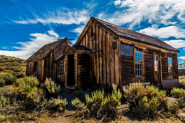Fototapeta na wymiar ghost town of abandoned houses in a old mining town in Bodie, California.