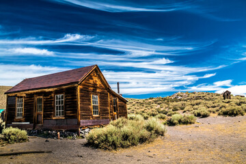 Fototapeta na wymiar ghost town of abandoned houses in a old mining town in Bodie, California.