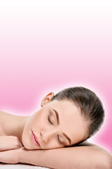 Obraz premium relaxed young woman with closed eyes after spa procedures on a pink background with a shaded white outline