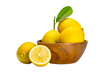 Lemons whole and half with leaves in wooden bowl on white background with clipping path.