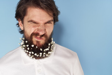 Cute man beard flowers decoration close-up isolated background