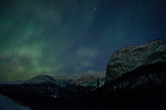 Aurora over Alaskan mountains