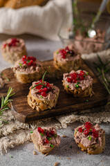 Homemade pate on heathy bread with cranberries