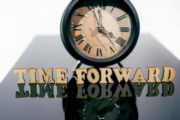 Daylight Saving Time. DST. Wall Clock going to winter time. Turn time forward. Abstract photo of changing time at spring.