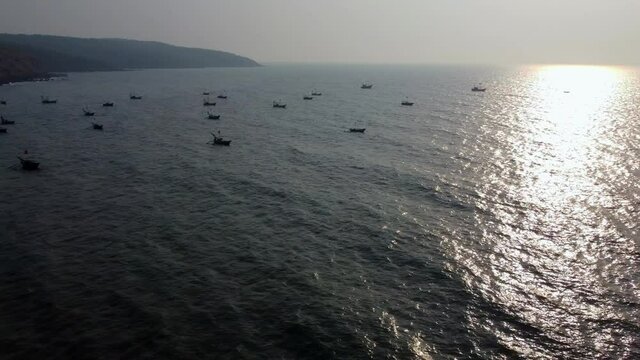 Fishing boats anchored off Ladghar beach at Dapoli, located 200 kms from Pune on the West Coast of Maharashtra India.
