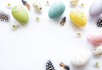 Colorful Easter eggs with spring blossom flowers