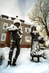 two children playing in snow