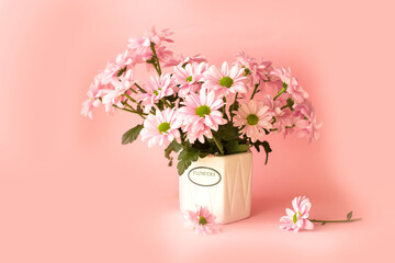 Colorful flowers bouquet on a bridht backgroung. Spring or summer card. Yellow and pink color concept.