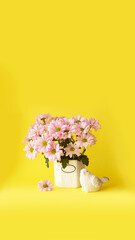 Colorful flowers bouquet on a bridht backgroung. Spring or summer card. Yellow and pink color concept.