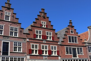 Fototapeta na wymiar Historic Dutch House Facades with Stepped Gables in Hoorn