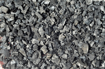a pile of wood charcoal