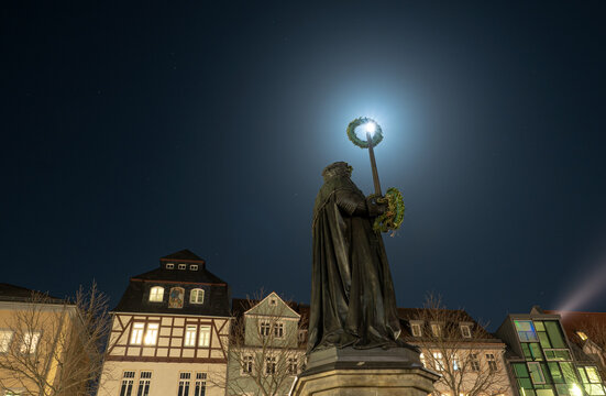 Longexposure in jena at night with full moon and Hanfried statue