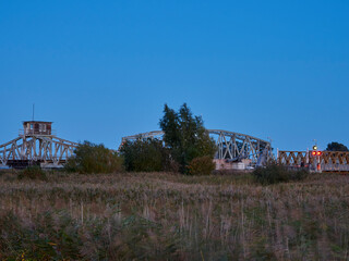 Fototapeta na wymiar Meiningenbrücke am Bodstedter Bodden bei Zingst am Abend, Nationalpark Vorpommersche Boddenlandschaft, Mecklenburg-Vorpommern, Deutschland