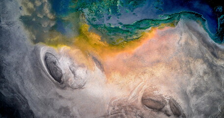 Dry lake or swamp in the process of drought and lack of rain or moisture, a global natural disaster - aerial drone view