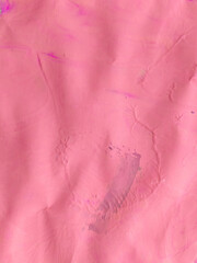 pink color paint texture on paper background. wallpaper.