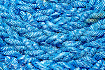 Close-up of ship rope weaves, thick rope on a ship, nautical theme © Kira