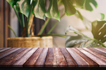 Surface of old grunge wooden table on potted plants and sunlight room background for product presentation involved in nature, relaxation and health, 3D illustration