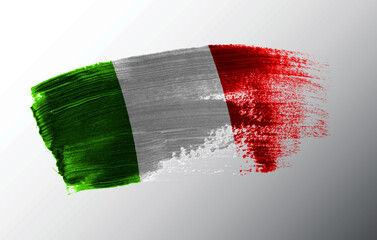 Italy flag illustrated on paint brush stroke