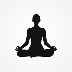 Silhouette of a human sitting in lotus position