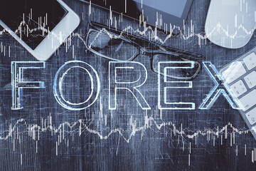 Multi exposure of forex graph hologram over desktop with phone. Top view. Mobile trade platform concept.