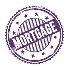 MORTGAGE text written on purple indigo grungy round stamp.