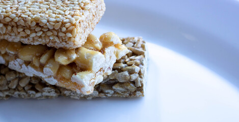 Delicious Honey kozinaki on a white plate