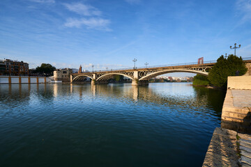 Fototapeta premium Seville, Andalusia, Spain, Europe. Isabel II bridge or Triana bridge Guadalquivir river