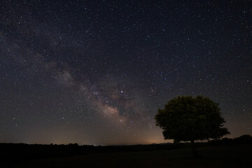 Fototapeta na wymiar Night landscape with Milky Way near Malpartida de Caceres. Extremadura. Spain.