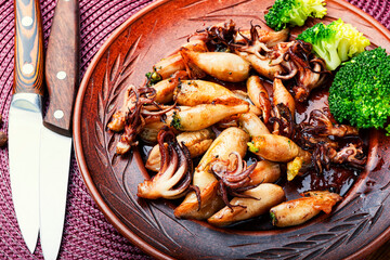 Grilled squids in plate