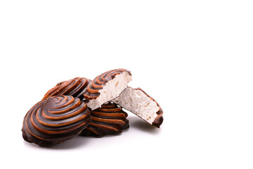 Chocolate-covered marshmallow close-up, isolated on a white background.Selective focus.