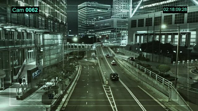 Cctv camera monitoring vehicle and highway roads in Hong Kong city.