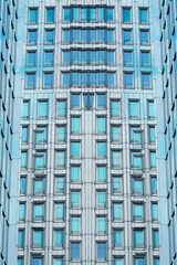 Fototapeta premium underside panoramic and perspective view to steel blue glass high rise building skyscrapers, business concept of successful industrial architecture