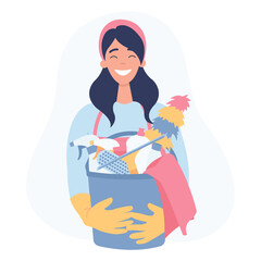 Young woman holding cleaning tools and products in bucket. Cleaning service concept.