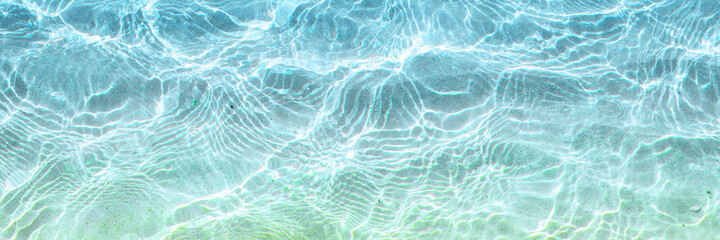 blue sea surface on a sunny day. Background. Top view. Banner.
